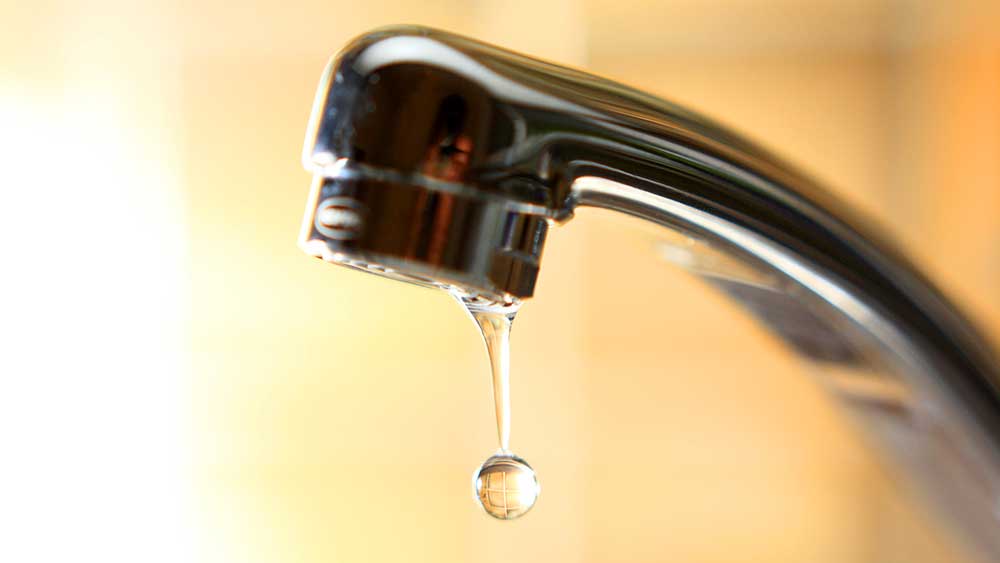 Faucet with a drop of water that will be tested as part of our home inspection services